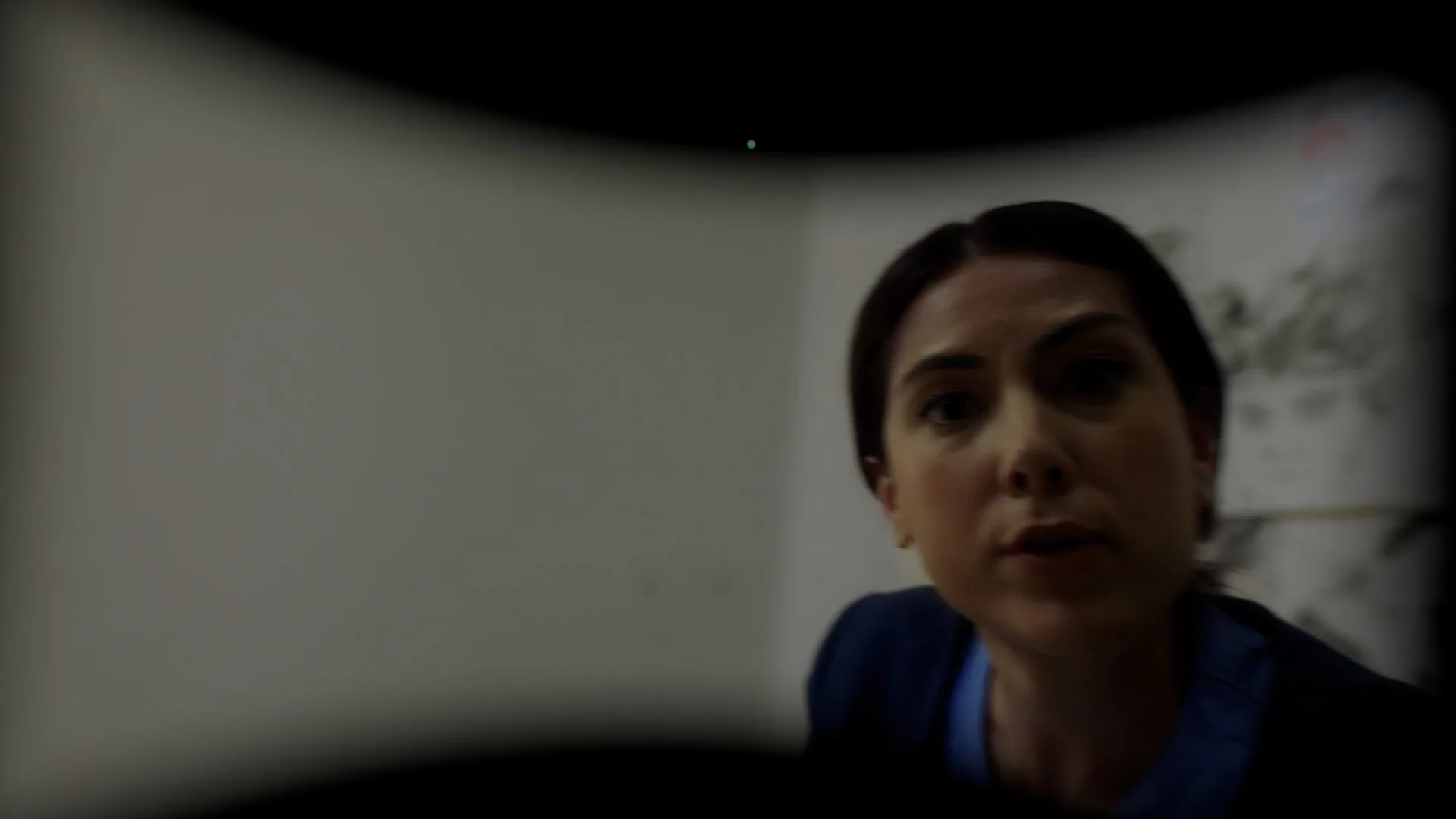 The athlete's view inside the headset of a person leaning in at close range on a curved immersive 180 degree screen